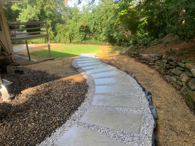 stone paver pathway with landscape rocksPicture